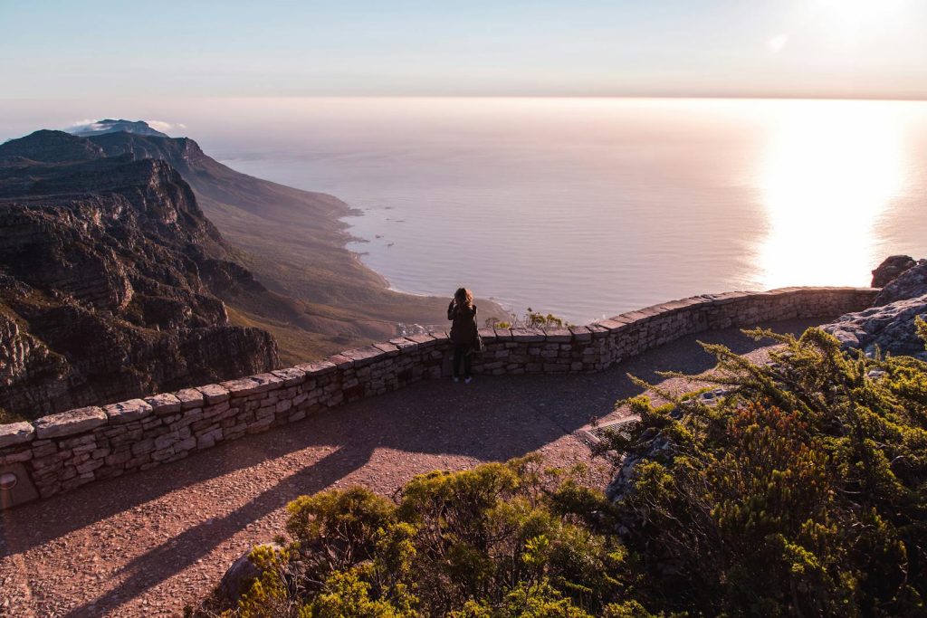 A breathtaking sunset over the Atlantic Ocean from Table Mountain, Cape Town.